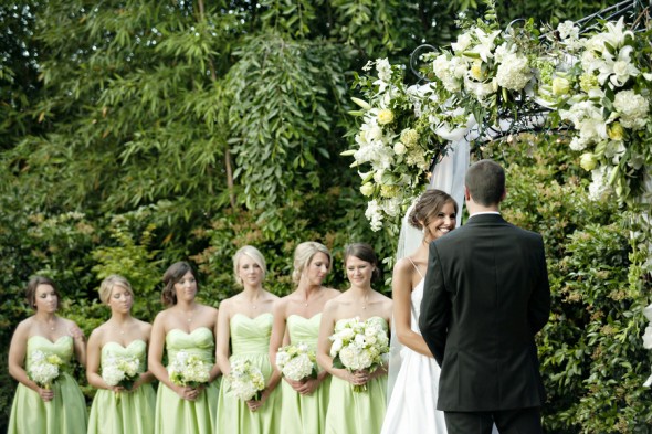 Outdoor Wedding Ceremony under Floral Arbor