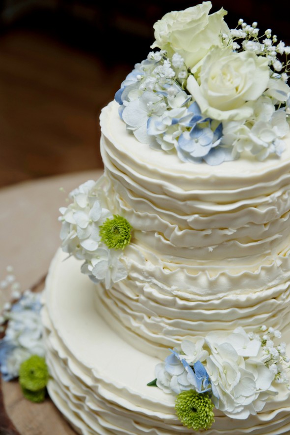 White Wedding Cake with Blue Flowers